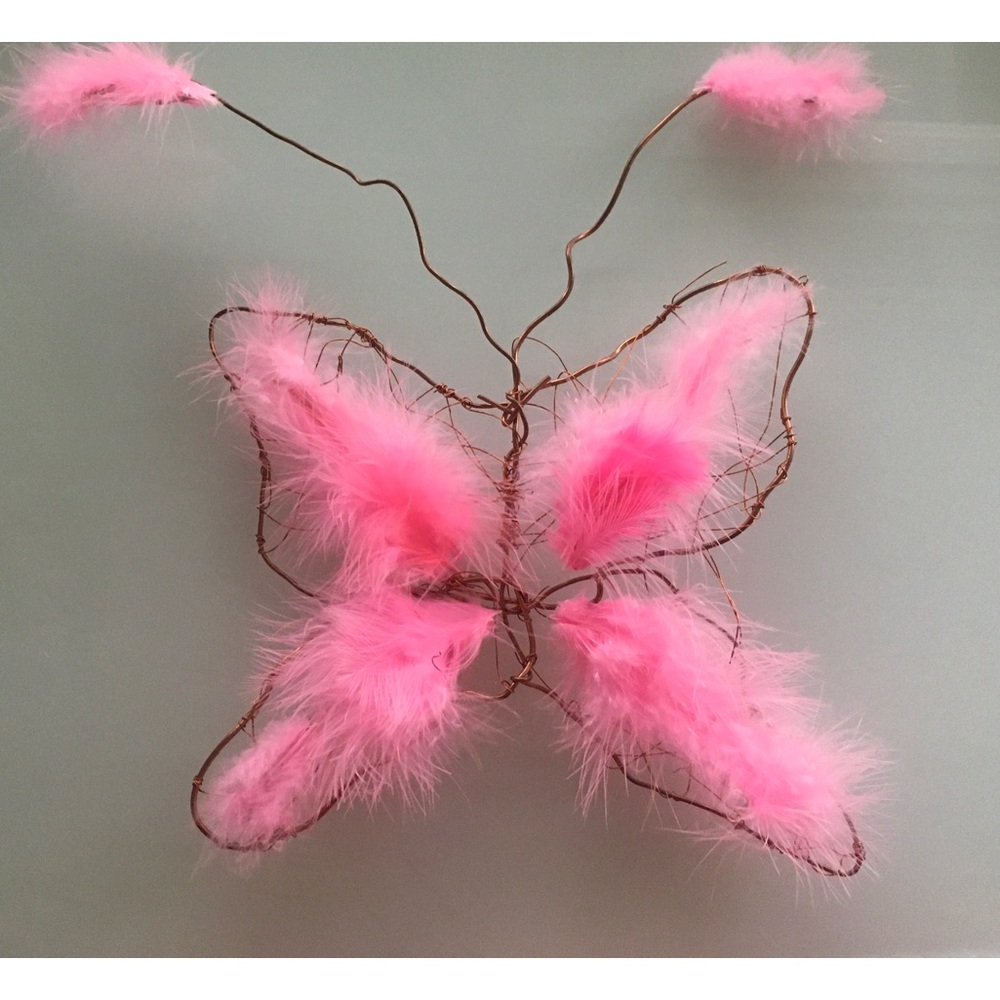 Handmade Butterfly from recycled copper and feathers